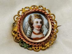 "Antique French brooch, gold color filigree, hand painted miniature on porcelain of a lady in Elizabethan costume, brooch with miniature. DESCRIPTION: Very lovley antique French brooch with a hand painted miniature on porcelain featuring a lady in Elizabethan costume, framed in gilt metal filigree, dating to early 1900's. HOW TO USE IT: A beautiful antique brooch with delightful miniature of lady, perfect gift for Valentine's Day! CONDITIONS: Good antique conditions, there are light oxydation tr Elizabethan Costume, Antique Locket, Hand Painted Roses, Antique Brooches, Rose Painting, A Lady, Vintage Italian, Antique Items, Vintage Brooches