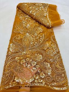 This high quality Fabric is measured in 5 Yards With Embroidered Beading and Sequin. It is soft, very delicate and beautiful. This high Quality Fabric is made with Fashion embroidered rhinestones can be used in making party wedding dresses, skirts, shawls, scarves and other other fashion apparels as you would like. Size : Length : 5 yards (180 inch). Width: 50 inch (Please allow slight deviation for the measurement data ,±1 inch) Material: 100% Polyester, Tulle Lace Fabric, Eco-Friendly embroidery Hand Beaded Lace, Lace Embroidery, Beaded Lace, Luxury Fabrics, Lace Fabric, Dress Making, Luxury Design, Quality Fabric, Beading