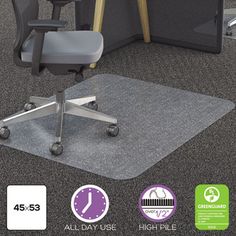 an office chair mat with wheels on the floor next to a desk and monitor screen