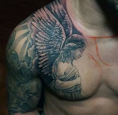 a man's chest with an angel tattoo on it, and the image is black and grey