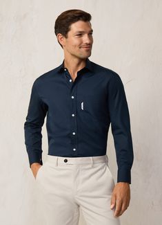 - Shirt in 100% cotton poplin. - Italian fabric with 120 thread count. - Regular fit. - Long sleeves. - Italian collar. - Patch pocket on the chest. - Façonnable logo label on front pocket. - Pleat in the centre back. - Rounded two-button cuffs. - Hanging loop on the back. Logo Label, Trendy Shirts, Italian Fabric, Poplin Shirt, Cotton Poplin, Front Pocket, Patch Pocket, New Collection, Thread