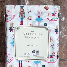 a sheet set with an image of a nutcracker in the middle and words,'weedlesley manor'on it