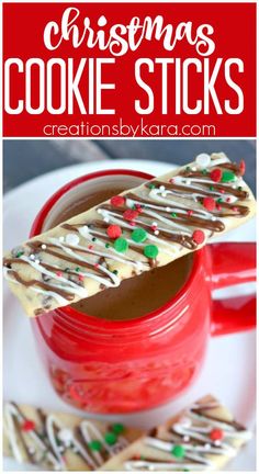 christmas cookie sticks in a red mug with white frosting and sprinkles