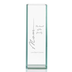 a clear glass award with the words'the heart of this family '