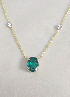 Perfect Emerald Diamonds Necklace for Wife to Be 7 x 5 mm Oval Pendant 14k Gold, Anniversary Necklace, Gold Necklace Gift, Wedding Necklace, Necklace for Bride. Setting Options (Choose & Checkout) White, rose or yellow Gold 14k or 18k Center Stone:  Emerald Chatham 7.00 x 5.00 mm  Carat weight 0.70 Color Green Clarity VS Cut Excellent  Side Diamond: 2 Diamond 0.10 Carat D VS1 Why ∙ It's ∙ Awesome ✓ Gemological Certificate  ✓ 20 Years of Experience ✓ 100% Original Designs ✓ Conflict-Free Diamonds Classic Yellow Gold Emerald Necklace With Oval Pendant, Classic Oval Emerald Necklace With Prong Setting, Classic Oval Emerald Necklace In Yellow Gold, Classic Yellow Gold Oval Emerald Necklace, Oval Emerald Gemstone Necklace In 14k Gold, Oval Emerald Necklace In 14k Gold, Oval Emerald Necklace With 14k Gold, Oval Emerald Necklace With Prong Setting For May Birthstone, Oval Emerald Necklace With Diamond Cut