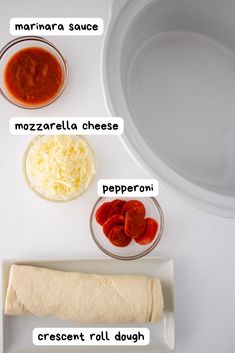 ingredients to make pizza dough laid out on a white counter top, including cheese, tomato sauce and mozzarella