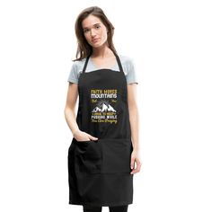 a woman wearing an apron that says mom you are the queen