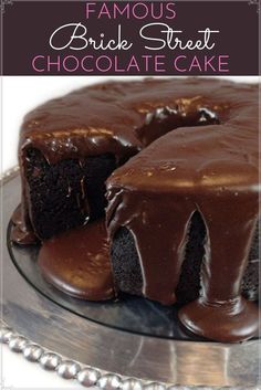 a chocolate cake on a plate with the words famous brick street chocolate cake