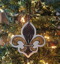 a christmas ornament hanging from a tree