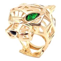 Cartier Panther Panthere 18k Yellow Gold Tsavorite Onyx Large Ring  Metal: 18k Yellow Gold Measurements:  Width: 1 1/4" Weight: 23.7 grams Stones: 2 tsavorite garnets in the eyes, onyx nose  Ring Size: European 55 US 7 1/4 Hallmarks: Cartier 750 55 ABM7XX(serial number omitted) T3437mhtdd  Dimensions reference the ring size and are not specific to the ring itself. Nose Ring Sizes, Cartier Panther, Cartier Panthere, Tsavorite Garnet, Large Ring, Ring Metal, Metal Rings, Cocktail Rings, Panther