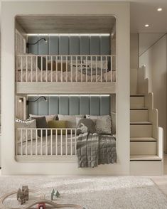 there is a bunk bed in the room with two sets of stairs on each side