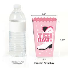 a plastic water bottle next to a pink box