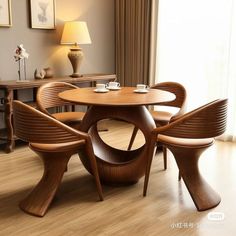 a wooden table and chairs in a room with wood flooring next to a window