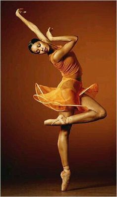 a woman is dancing with the words naci para danza in front of her