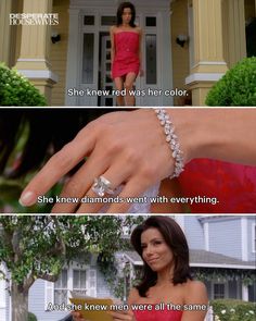 a woman in a red dress is holding her hand out to the camera, and she's wearing a diamond bracelet