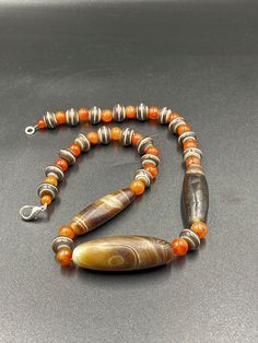 The beautiful banded agate necklace with good conditions As you can see 3 big size banded agate beads along with round small size banded agate in between and orange color carnelian beads . beautiful combination and beautiful collection we provide fast and free shipping to our customers by which you can get the item maximum 7 working days Artisan Agate Beaded Necklace With Faceted Beads, Artisan Agate Beaded Necklaces With Faceted Beads, Artisan Rondelle Polished Beads, Traditional Agate Beaded Gems And Cabochons, Traditional Agate Large Beads, Artisan Agate Polished Beads, Unique Polished Agate Beads, Artisan Polished Agate Beads, Traditional Beaded Agate Gems And Cabochons