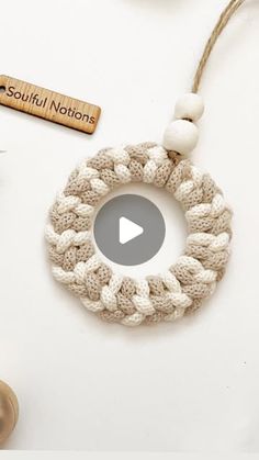 a video demonstrating how to make a crochet wreath ornament with beads