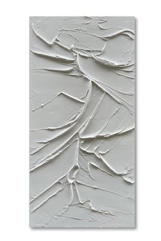 an abstract painting with white paint and lines on the wall, in shades of grey