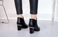 Department Name:Adult Item Type:Boots With Platforms:Yes Outsole Material:Rubber Closure Type:Slip-On Insole Material:PU Platform Height:0-3cm Toe Shape:Pointed Toe is_handmade:Yes Season:Winter Heel Type:Square heel Boot Type:Chelsea Boots Heel Height:High (5cm-8cm) Fashion Element:Rivet Fit:Fits true to size, take your normal size Model Number:OL-vi1 Boot Height:Ankle Pattern Type:Solid Shoe head style:Sharp head Popular element:Rivet waterproof table Edgy Ankle-high Martin Boots For Winter, Fitted Casual Martin Boots For Parties, Casual Fitted Martin Boots With High Heel, Casual Martin Boots With High Heel, Black Pointed Toe Winter Boots, Winter Black Chelsea Boots, Casual Pointed Toe Martin Boots For Party, Winter Black Ankle-high Martin Boots, Black Chelsea Boots For Winter