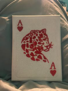 a handmade card with a red cat on it