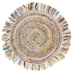 a round rug with multicolored fringes on the center and bottom in various colors