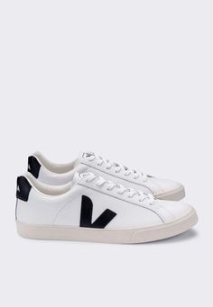 Veja esplar logo leather - extra white/black    since 2005 veja has been creating footwear differently by infusing each stage of production with positive impacts. environmentally friendly sneakers made with raw materials sourced from organic farmer and ecological agriculture without chemicals or polluting processes.    fit: true to size - but if you're between sizes it's better to take the size down  sizing: eu - (check the sizing guide  above for men's / women's size conversions)    read our 'v Veja Esplar, Four Horsemen, Sugar Cane, Recycled Rubber, Sneaker Brands, Golden Goose Sneaker, Environmentally Friendly, Leather Shoes, Chemicals