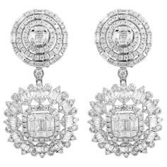 These stunning earrings are handcrafted in 18-karat white gold and set in 5.10 carats of sparkling diamonds. Available in white, rose and yellow gold. FOLLOW MEGHNA JEWELS storefront to view the latest collection & exclusive pieces. Meghna Jewels is proudly rated as a Top Seller on 1stDibs with 5 star customer reviews. All items manufactured by us are handmade and can be customized or redesigned. Certificate available upon request. Composition Total Weight :- 13.79 gm 18k White Gold Weight :- 12 Luxury Diamond Bridal Earrings With Pave Setting, Gia Certified Luxury Diamond Earrings For Formal Occasions, Luxury Platinum Diamond Earrings With Baguette Diamonds, Luxury Platinum Baguette Cut Earrings, Luxury Platinum Baguette Diamond Earrings, Luxury Diamond Earrings With Baguette Cut, Luxury White Brilliant Cut Bridal Earrings, Luxury Baguette Cut Diamond Earrings With Accents, Luxury Baguette Cut Diamond Earrings