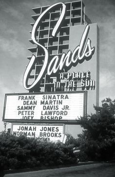 the sands casino sign is shown in black and white