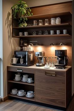 there is a coffee bar with many cups and saucers on the counter in this room