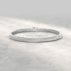 This Thanksgiving, unveil the brilliance of our 11-Carat Baguette Cut Diamond Chevron Tennis Bracelet, meticulously handcrafted in your choice of 10K, 14K, or 18K solid gold. Adorned with ethically sourced lab-grown diamonds, this exquisite bracelet offers captivating sparkle and ethical luxury. Perfect as a thoughtful gift for a special occasion, it radiates sophistication and modern elegance, making it an unforgettable addition to her jewelry collection. 𝐅𝐞𝐚𝐭𝐮𝐫𝐞𝐬: * 𝐌𝐚𝐝𝐞 𝐭𝐨 𝐎𝐫? Luxury Elegant Baguette Cut Bracelets, Luxury Elegant Baguette-cut Bracelet, Luxury Elegant Baguette Cut Bracelet, Luxury Baguette-shaped Elegant Bracelet, Luxury Baguette Cut Gold Bracelet For Gift, Luxury Elegant Baguette Tennis Bracelet, Luxury Elegant Gold Bracelet With Baguette Cut, Luxury Elegant Baguette Diamond Bracelet, Luxury Baguette Cut Diamond Bracelet