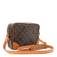 This is an authentic LOUIS VUITTON Monogram Trocadero 27. This shoulder bag is crafted of monogram coated canvas. The bag features a vachetta leather shoulder strap and trim, gold hardware and an exterior flat pocket. The top zipper opens the bag to an interior of terra cotta cross-grain leather with a zipper pocket. Terra Cotta, Authentic Louis Vuitton, Gold Hardware, Louis Vuitton Monogram, Zipper Pocket, Grain, Shoulder Strap, Louis Vuitton, Monogram