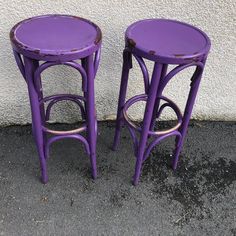 two purple stools sitting next to each other