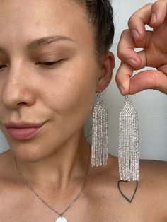 Shiny silver seed bead earrings are made from selected Czech beads. It can be an excellent personalized gift for bridesmaids, Mothers Day, birthdays, Valentine's Day, Wedding day, Christmas, New Year, and for your loved ones. ♡ Beveled earrings: Length - 4.3'' (11 Centimeters) ♡ Width - 1,2'' (3 Centimeters) ♡ Streight earrings: Length - 3.7'' (9,5 Centimeters) ♡ Width - 1'' (2,5 Centimeters) ♡ Quality Czech beads ♡ Stainless steel hooks If you like these bright glossy beaded earrings but would Czech Beads Jewelry, Beaded Jewelry Earrings, Evening Earrings, Pastel Earrings, Bridal Earrings Chandelier, Loom Jewelry, Earrings Chandelier, Native American Beaded Earrings, Handmade Earrings Beaded