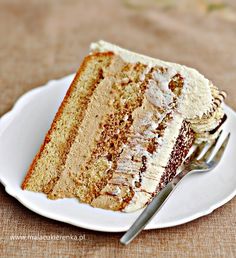 a slice of cake on a plate with a fork