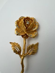 "Vintage Goldette gold tone rose rhinestone brooch  In very good condition, unable to clearly see Goldette marking but the plate where it goes is there, may just be faint or misprint Measures 2.5\" 2023" Formal Gold Brooch With Rose Design, Vintage Yellow Gold Brooches With Rose Cut Diamonds, Vintage Gold Flower Brooch, Beaded Scarf, Vintage Gold Flower Shaped Brooch, Gold Flower-shaped Rhinestone Brooches, Scarf Rings, Sunflower Pendant, Vintage Monet