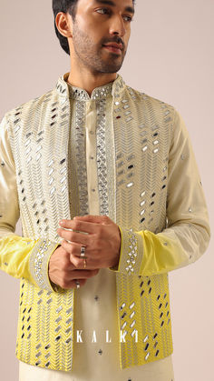 Induce a dash of fun and vibrant colors at the next big destination wedding by wearing this captivating set.
It features glimmering mirror accents and comes crafted on a dualtone ombre silk fabric.
An absolute musthave when you wish to amp up your look.
This set includes a kurta jacket and pants. Colourful Kurta For Men, Traditional Outfit Men, Indian Wedding Outfits Men, Designer Kurta For Men, Wedding Sherwani For Groom, Kurta Designs Men's, India Fashion Men, Indian Wedding Clothes For Men, Boys Kurta Design