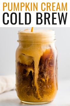 pumpkin cream cold brew in a mason jar with text overlay that reads, pumpkin cream cold brew