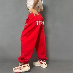 Made from top-quality polyester and cotton materials, these loose sweatpants for women complement your carefree personality perfectly. Featuring a straight fit that is further enhanced by their flat front design, these hip-hop bottoms come with an elastic waist that ensures you stay comfortable for hours. Adorned with pockets that not only look great but are super convenient too, this trendy streetwear is a must-add to your collection!Specifications Waist Type: MID Style: Casual Season: Spring/A Loose Sweatpants, Sweatpants For Women, Streetwear Pants, Trendy Streetwear, Front Design, Women's Casual, Fashion Pants, Season Spring, Cotton Material