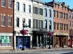 several buildings line the street in front of each other