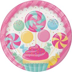 a pink paper plate with cupcakes and lollipops on it