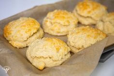 some biscuits are sitting in a paper bag