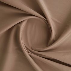 a close up view of a plain tan fabric