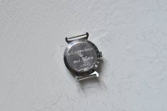 Engraving on back side of the watch Minimal Watch, Personalized Watches, Watch Engraving, Zip Code Gifts, Minimalist Watch, Men's Vintage Watch, White Watch, Buy Watches, Ring Watch