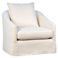 a white chair with two pillows on it