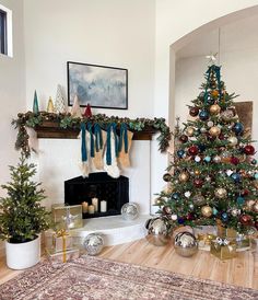 a living room with a christmas tree and other decorations