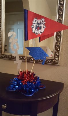 a table with some red, white and blue decorations on it