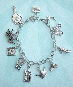 this charm bracelet features fairy tale inspired tibetan silver charms (nickel free).each charm is attached to a silver tone 7.5 inches chain bracelet Whimsical Silver Charm Bracelet, Whimsical Silver Bracelet Jewelry, Whimsical Silver Dangling Charms, Whimsical Nickel-free Silver Charm Bracelet, Themed Silver Charm Bracelet, Whimsical Silver Jewelry With Vintage Charm, Themed Silver Bracelets With Charms, Bracelets With Charms, Princess Charming