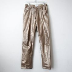 "Vintage 90s HUGO BUSCATI Bronze Genuine Leather Pants-Size 6 Tall.  An AMAZING pair with luxurious colored leather, butter soft feel, gorgeous metallic statement color, and perfect high rise fit. Slim straight leg with clean silhouette. Looks amazing styled with a casual tee and makes the best going out pant! Condition: a little worn on the knee area, typical and purely on the shape but not the leather finish, & small faded spot otherwise the leather is in great shape with tons of life left! 10 Vegan Leather 90s Straight Pants, Luxury Gold Straight Pants, Vintage Leather Straight Leg Pants, Gold Fitted High-waisted Pants, Metallic Fitted Full-length Pants, Leather Moto Pants, Moto Pants, Biker Chic, Leather Finish