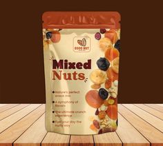 a bag of mixed nuts sitting on top of a wooden floor