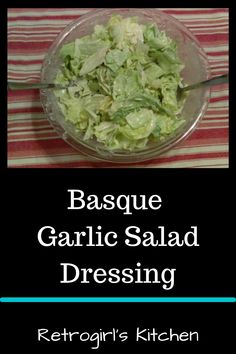 a glass bowl filled with salad sitting on top of a table